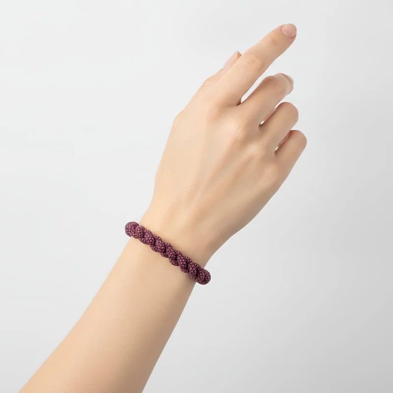 Bracciale tubolare con strass intrecciati - Rosa