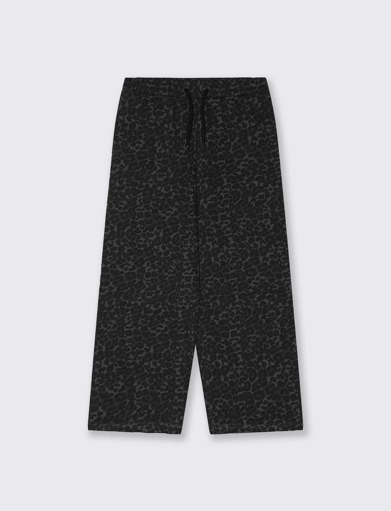 Jogger gamba larga con stampa trendy - Nero