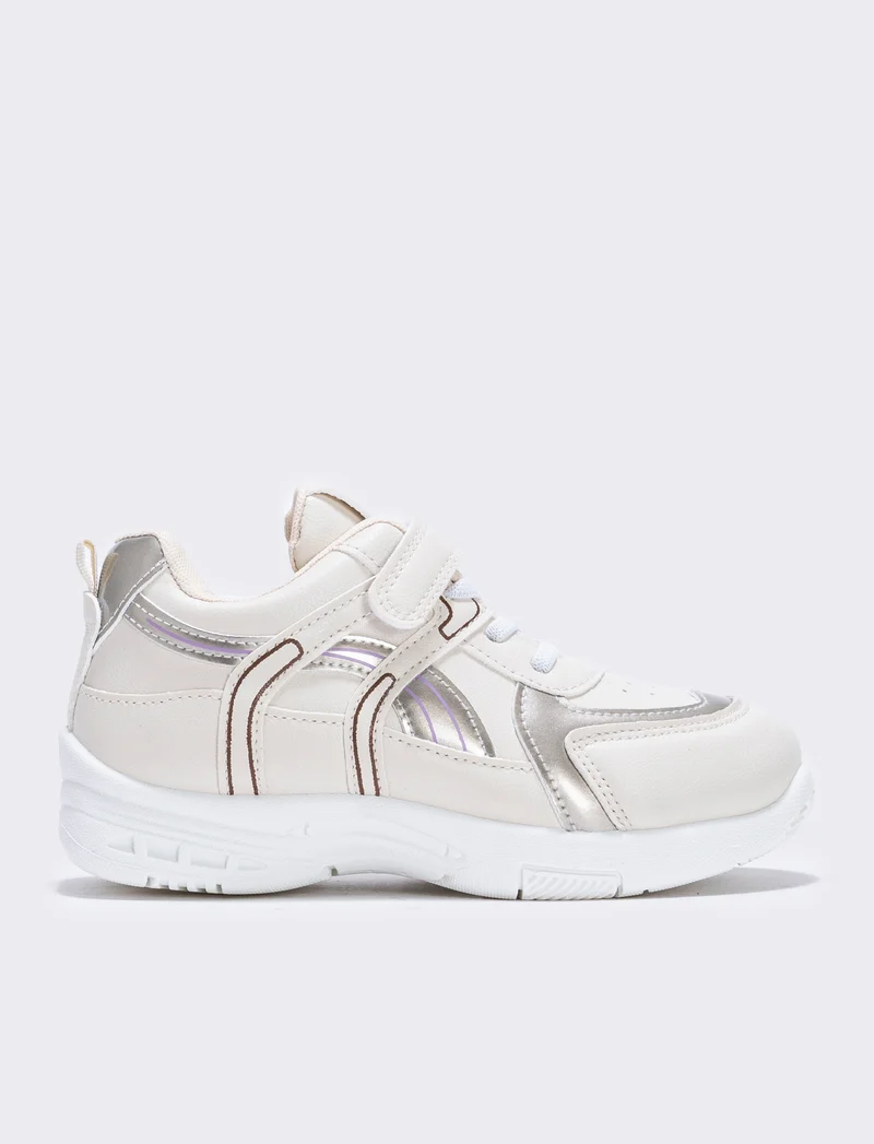 Sneakers beige da bambina con strappo - Beige
