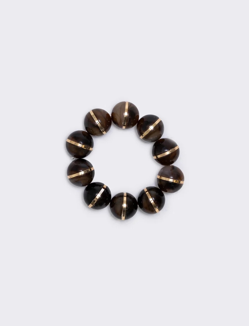 Bracciale elastico con sfere in pietra - Marrone