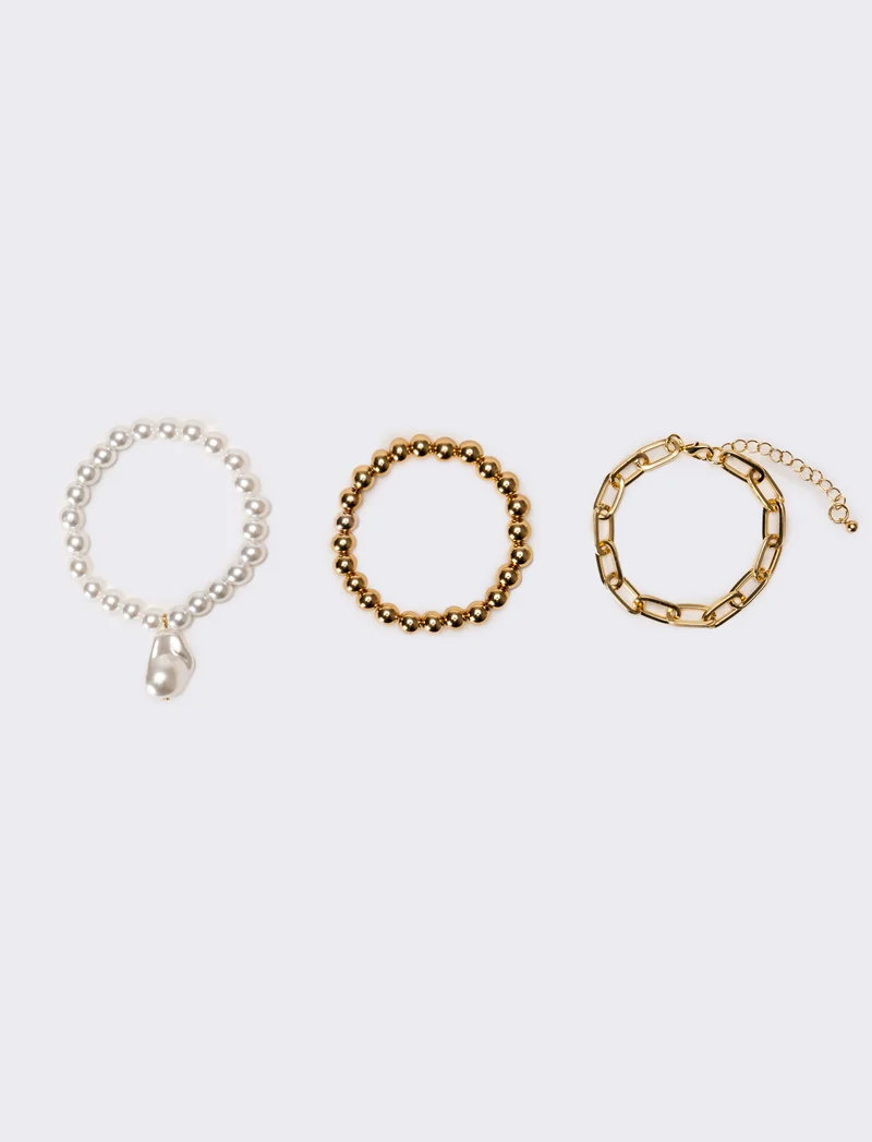 Bracciali donna 3 elastici con palline - Oro