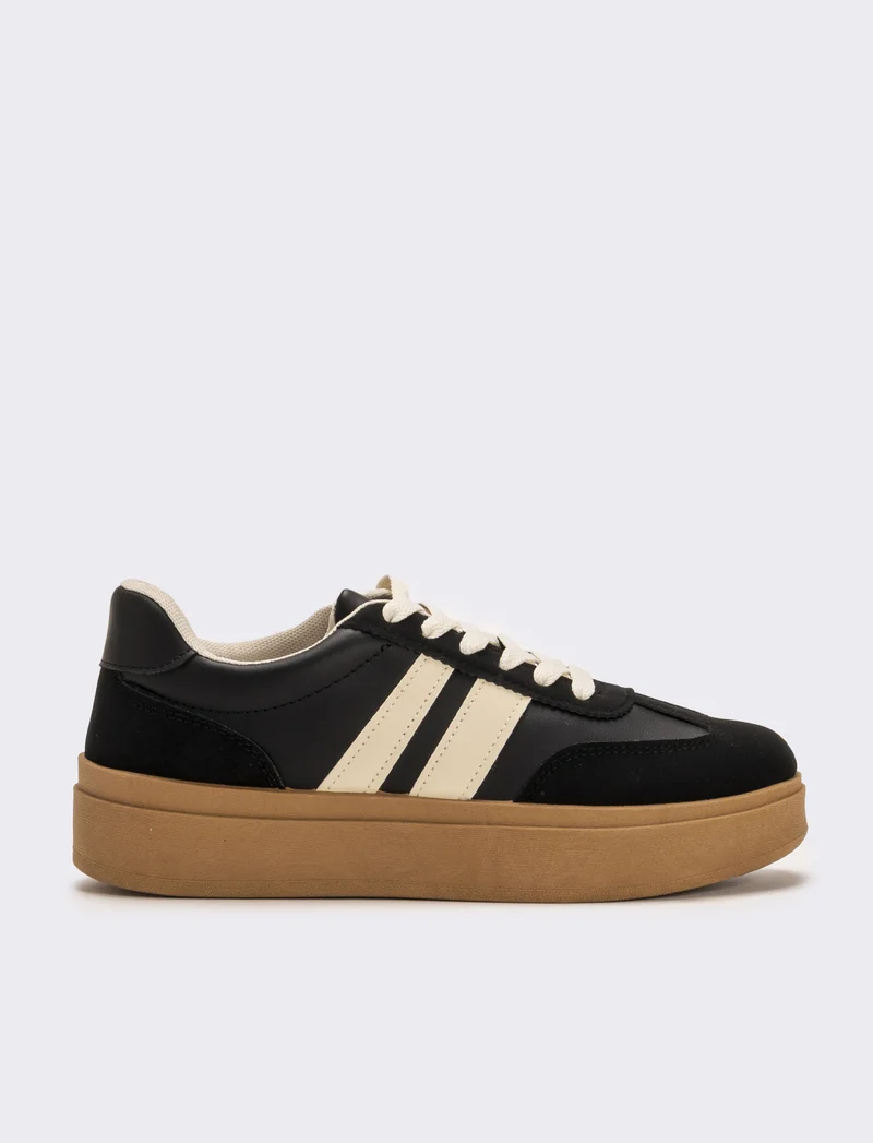 Sneakers con plateau da donna - Nero